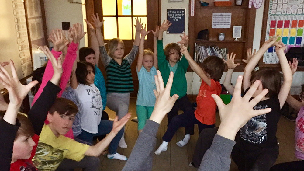 Kids Doing Yoga in Classroom